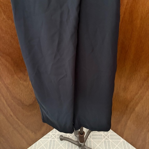 LULULEMON sz 4 With The Flow Black Pants Wrap Front Travel Woven - Picture 3 of 7